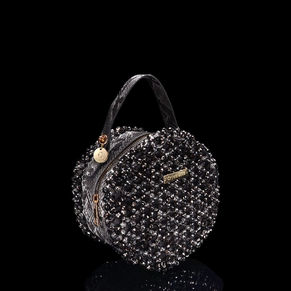 Side View of Handmade Snakeskin Crystal Round Bag with Leather Body