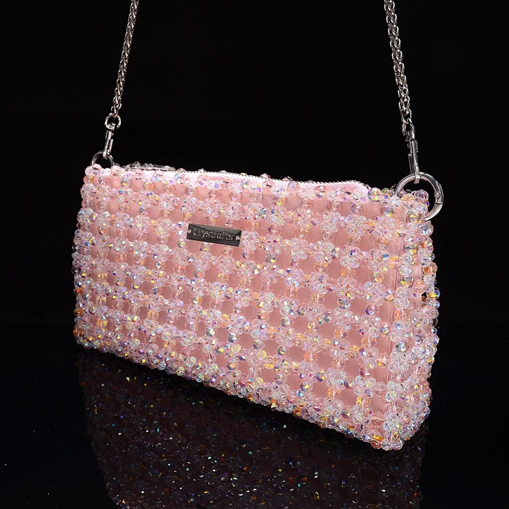 Side view of pink crystal zipper bag showing handwoven 8mm AB main beads and 4mm white AB accent beads, lightweight and spacious design