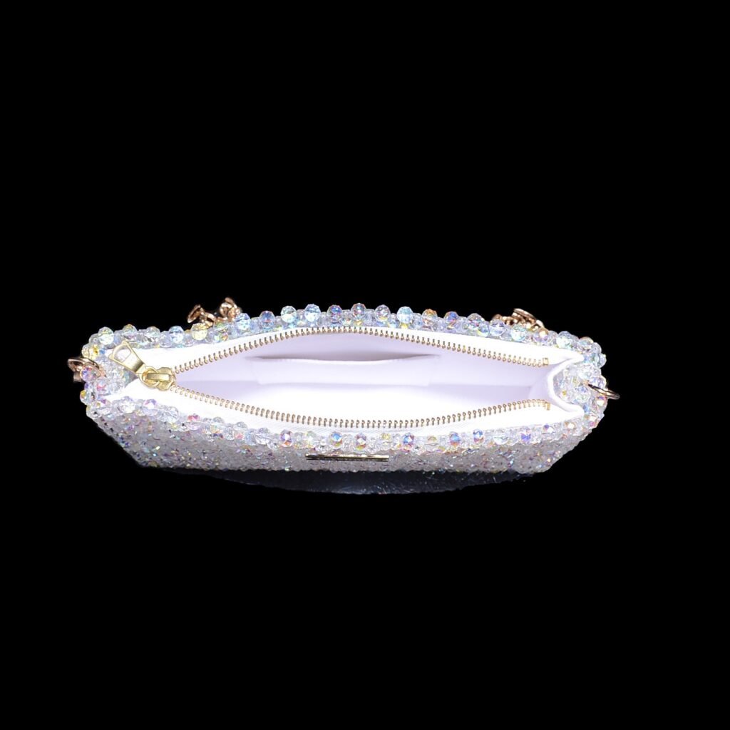 Interior lining of classic crystal beaded zipper bag with organized storage space
