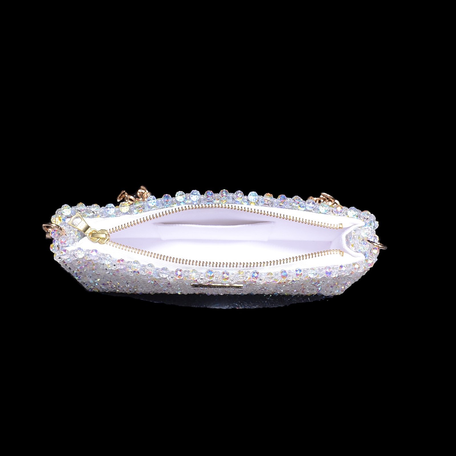 Interior lining of classic crystal beaded zipper bag with organized storage space